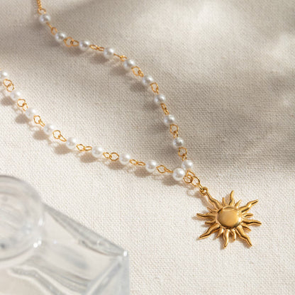 Elegant 18K gold-plated pearl sun pendant necklace