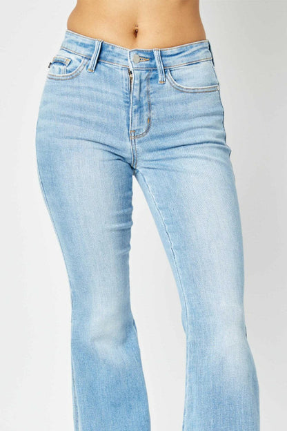 Judy Blue Full Size Mid Rise Raw Hem Slit Flare Jeans.