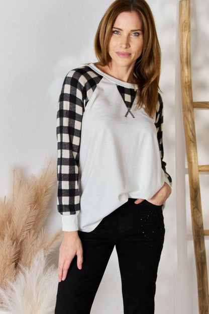 Hailey & Co Full Size Plaid Raglan Sleeve Round Neck BlouseUpgrade Your Style with Hailey &amp; Co Plaid Raglan Sleeve Blouse
 Revamp your wardrobe with our Full Size Plaid Raglan Sleeve Round Neck Blouse by Hailey &amp; Co.Love Salve Full Size Plaid Raglan Sleeve Round Neck BlouseBlouses