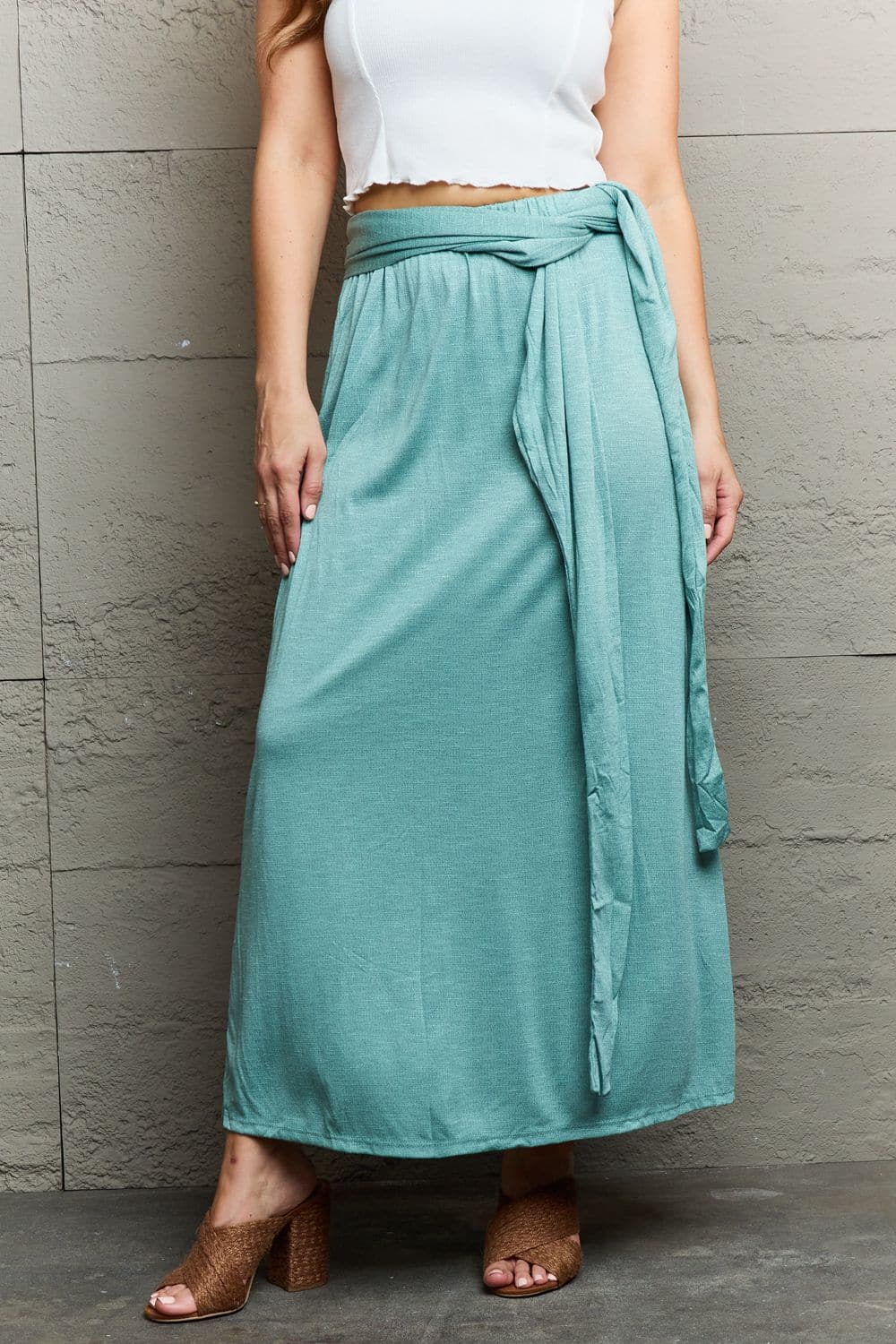 Elevate your elegance with the Ninexis criss cross halter neck maxi dress