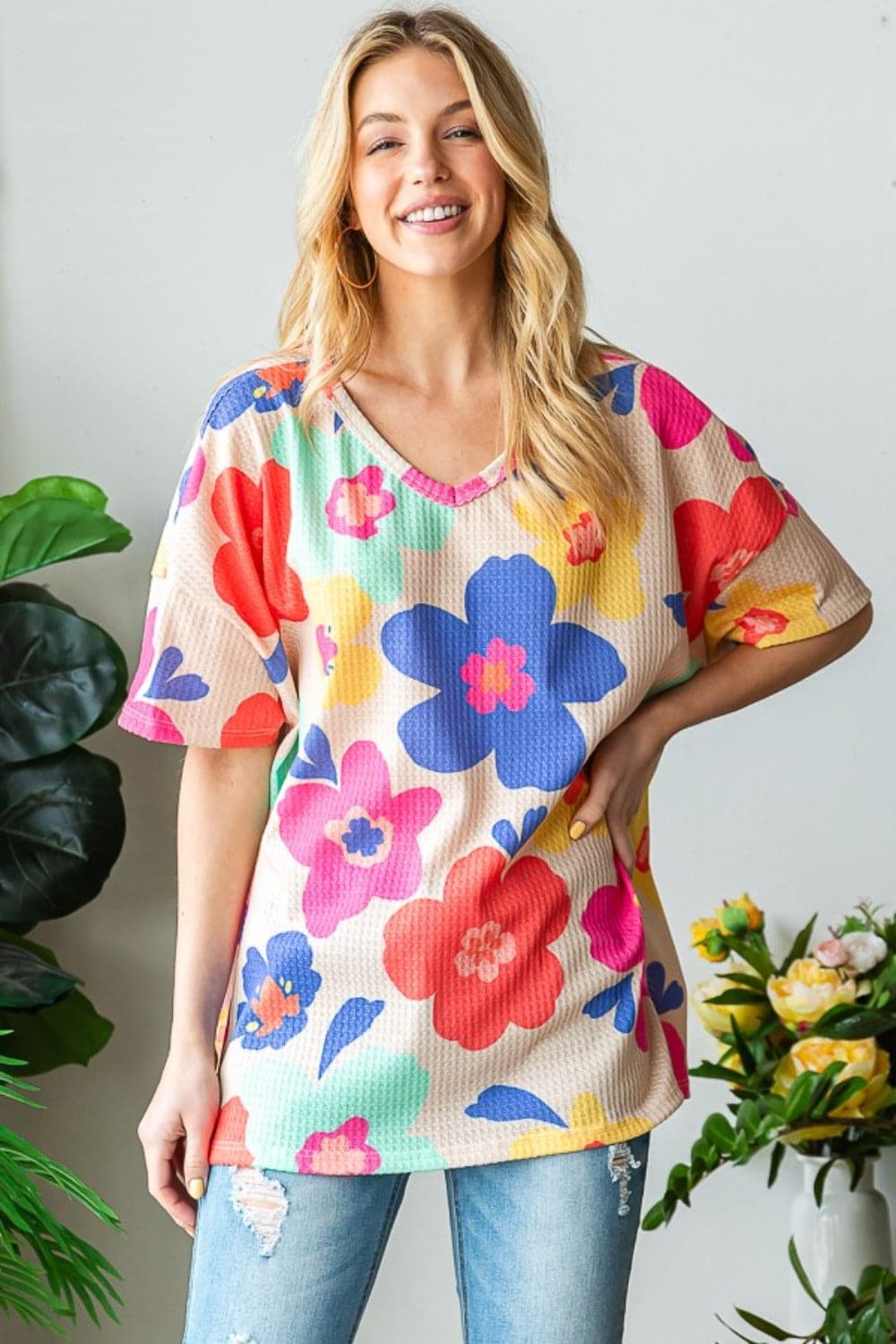 HOPELY Full Size Floral V-Neck Side Slit T-Shirt.