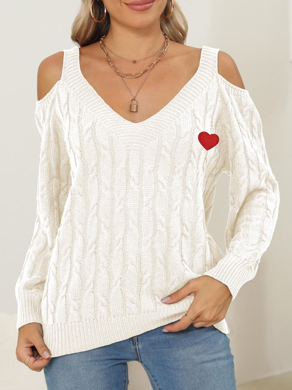 Cozy cable-knit heart v-neck sweater