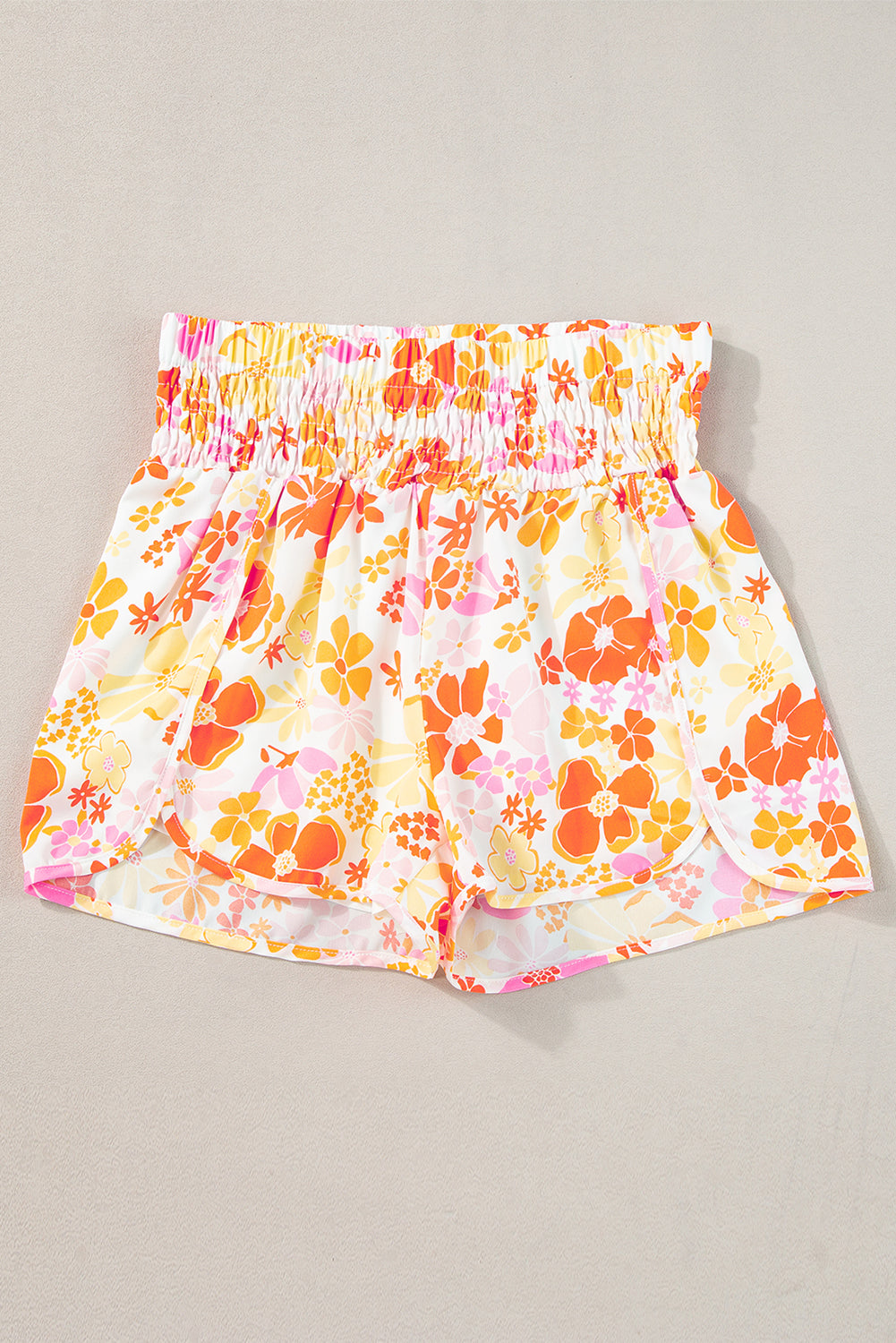 Chic orange floral high-waisted casual shorts with shirred detailing