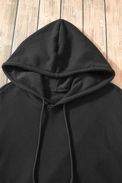 Cozy black fleece-lined hoodie with kangaroo pocket and drawstring design