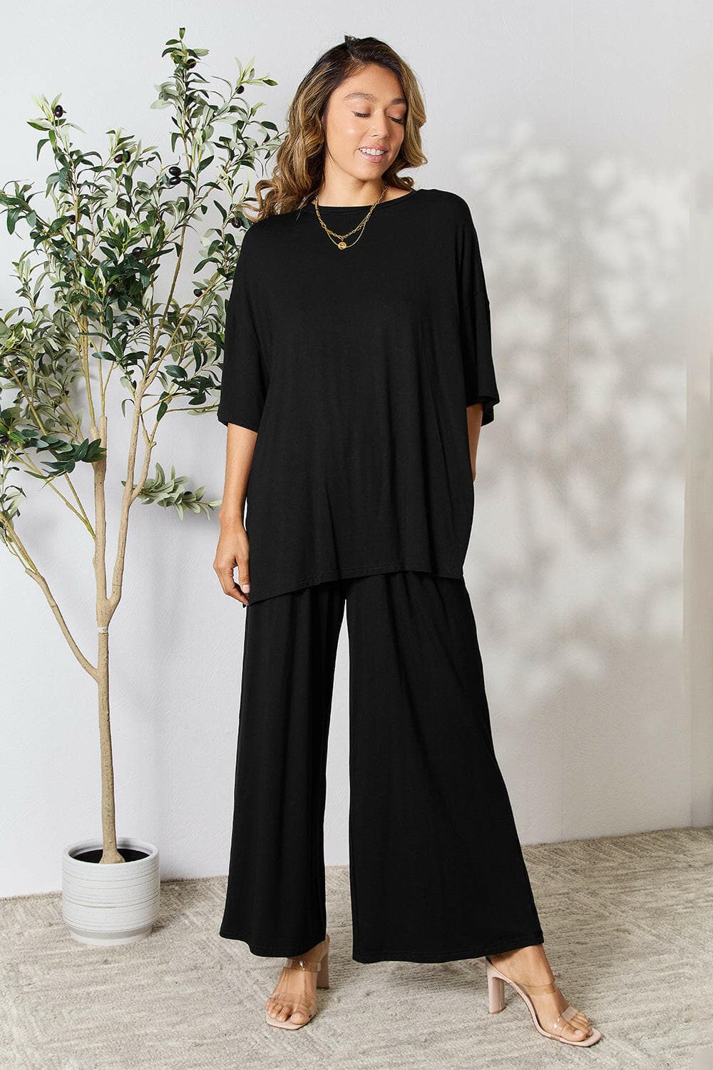 Double Take Full Size Round Neck Slit Top and Pants SetUpgrade Your Style with the Double Take Set
 Step into sophistication with our Double Take Full Size Round Neck Slit Top and Pants Set. This chic and versatile two-pLove Salve Full Size Round Neck Slit Topusa