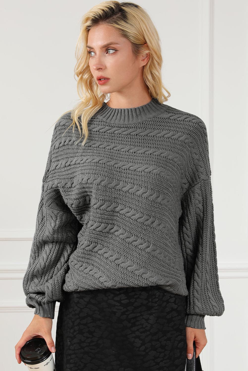 Cable-Knit Mock Neck Dropped Shoulder Sweater.