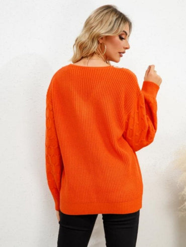 Dropped shoulder v-neck sweater with long sleeves