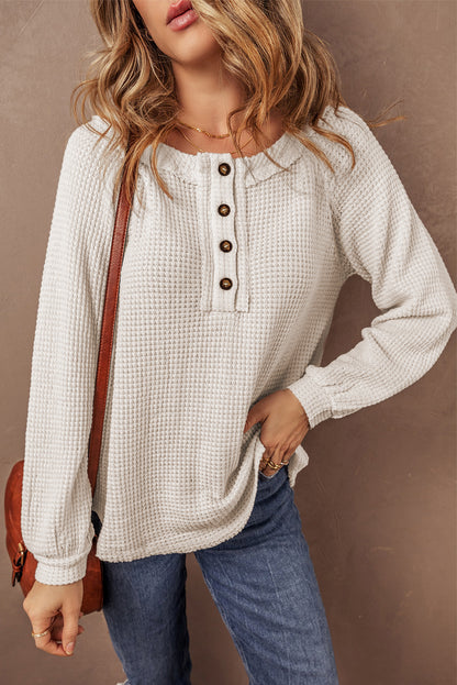 Cozy oatmeal waffle knit blouse with buttoned front and raglan sleeves