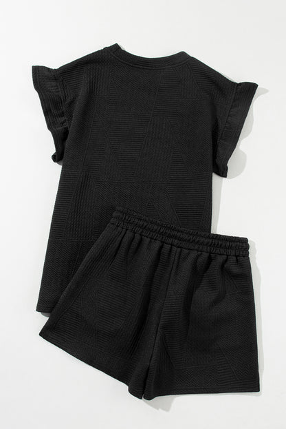 Chic black ruffled top and drawstring shorts set