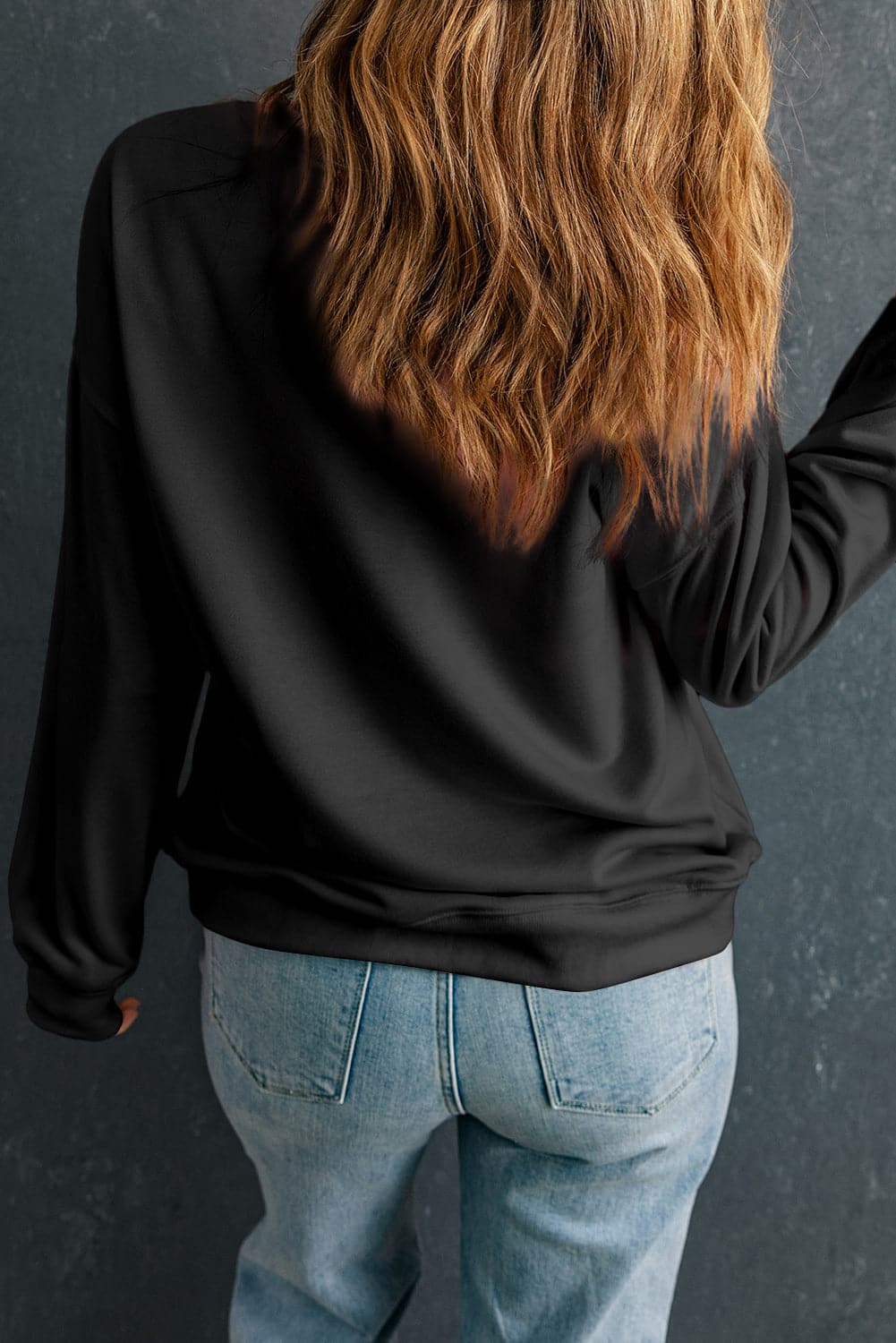 Round Neck Dropped Shoulder Sweatshirt.