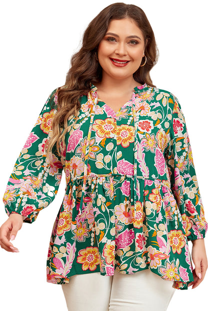 Floral elegance: Plus size green babydoll top with tied V-neck