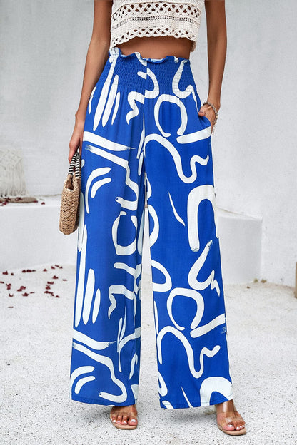 Smocked Printed Wide Leg Pants with Pockets.