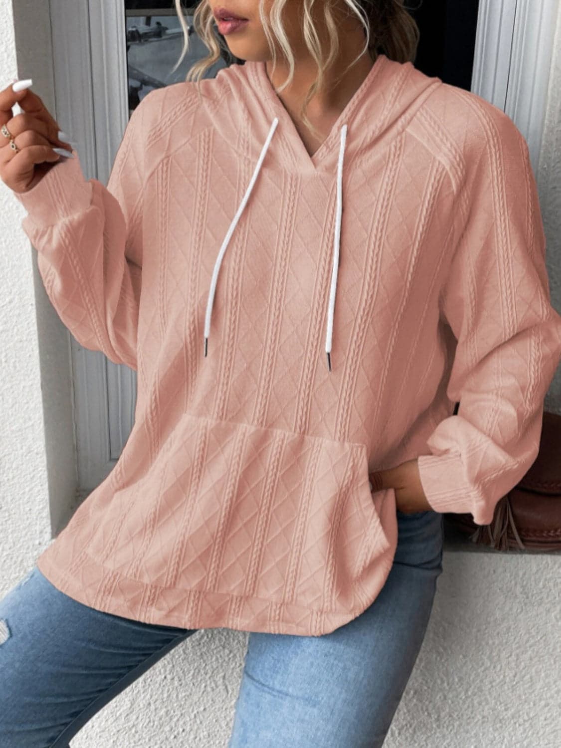 Cozy pocketed sheer hoodie with drawstring and long sleeves