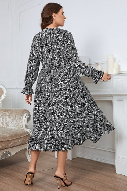 Melo Apparel Plus Size Printed V-Neck Flounce Sleeve Midi Dress.