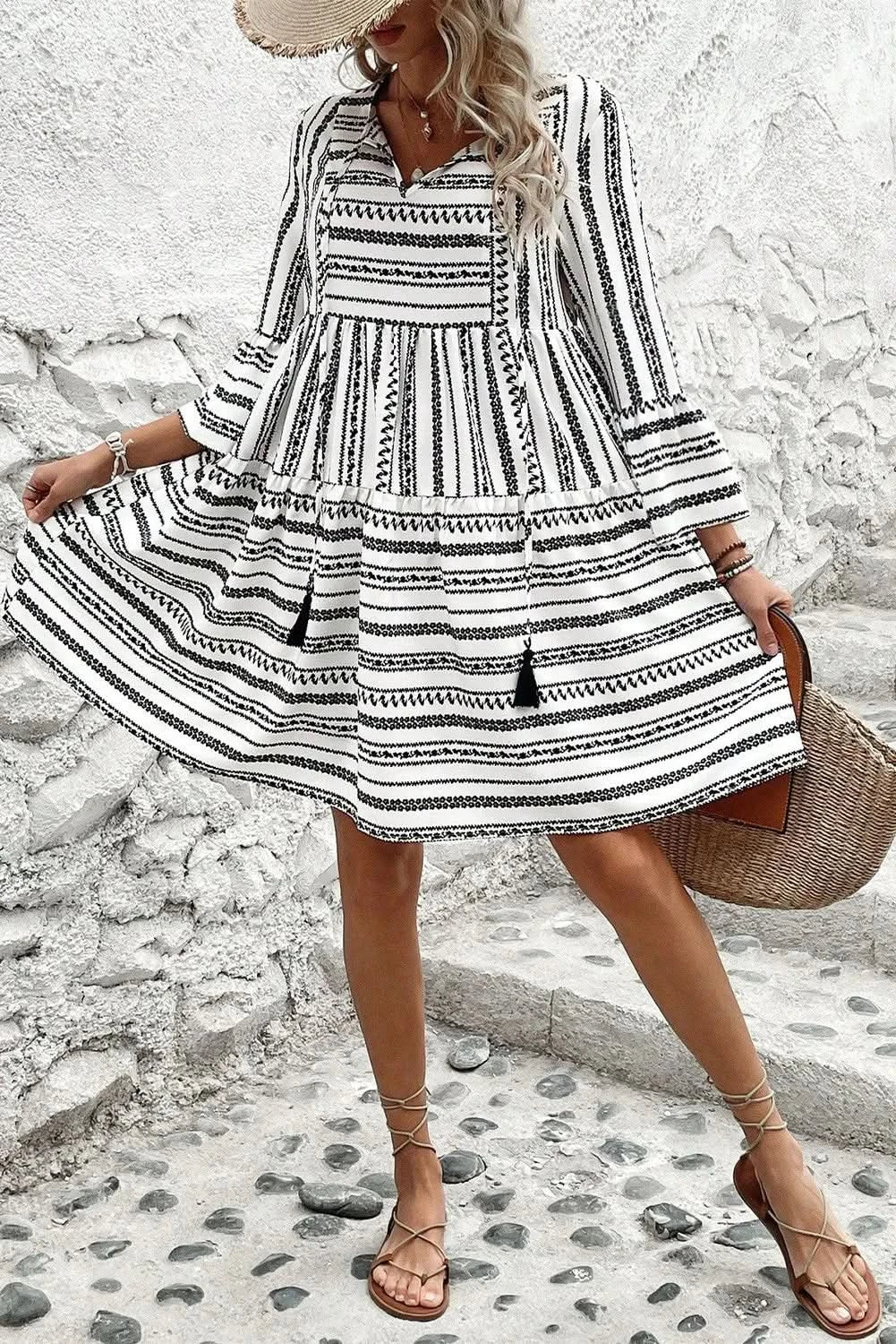 Chic printed tie neck mini dress with three-quarter sleeves