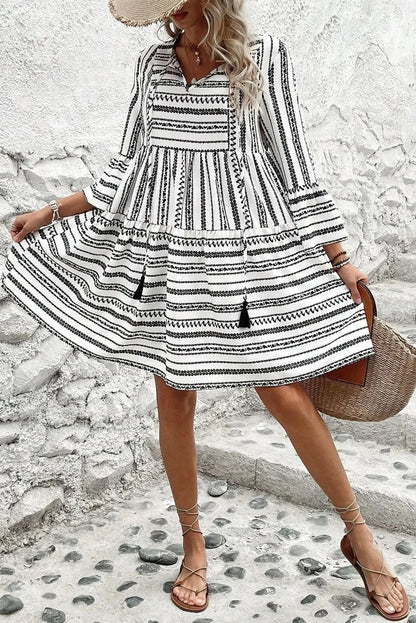 Chic printed tie neck mini dress with three-quarter sleeves