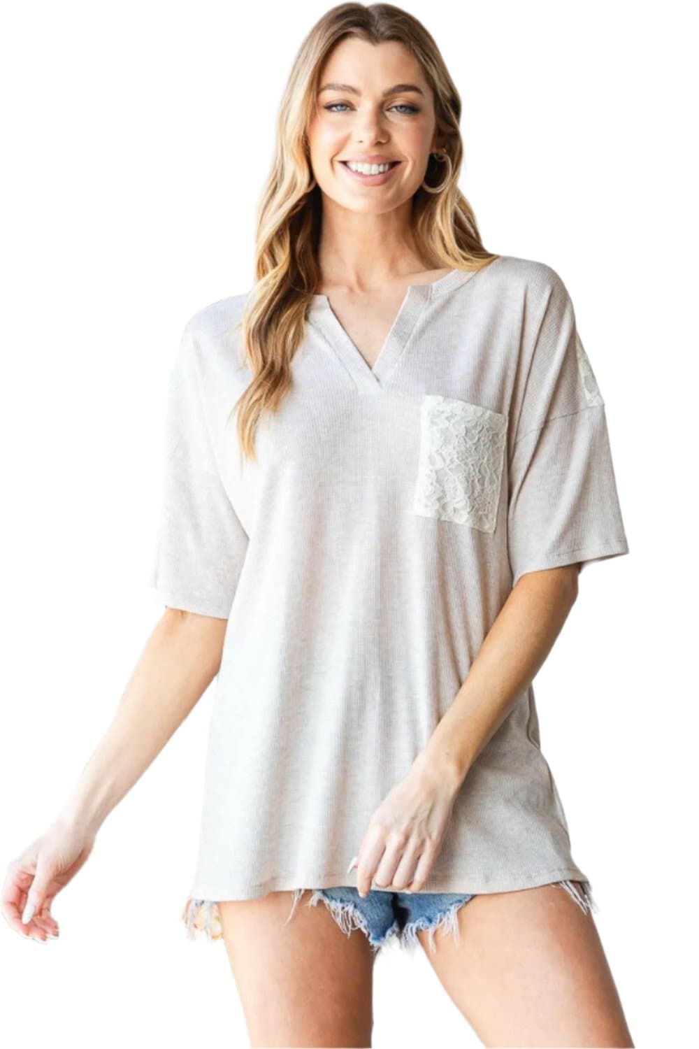 Heimish Full Size Lace Front Pocket Drop Shoulder Top with chic and modern style.