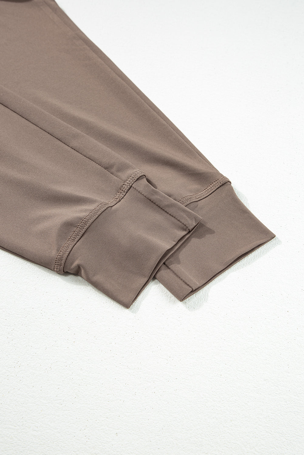 Cozy dark brown joggers with adjustable drawstring and pockets