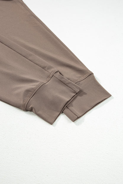 Cozy dark brown joggers with adjustable drawstring and pockets