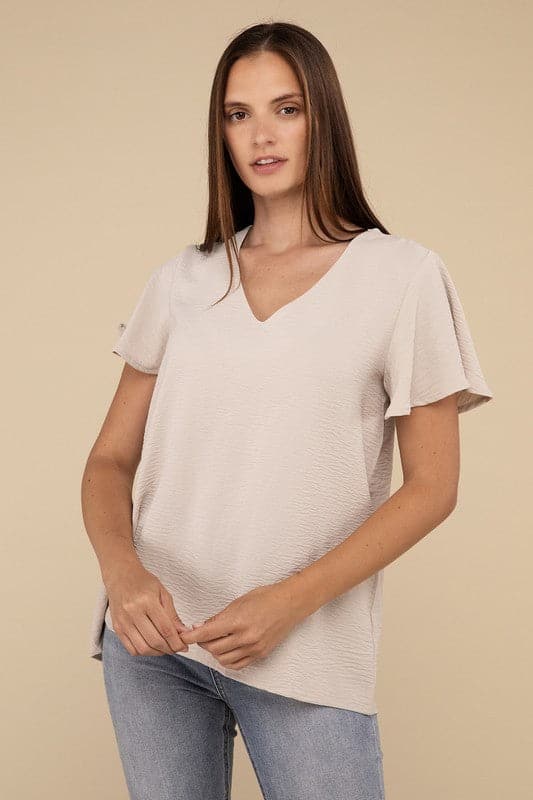 Woven Airflow Flutter Sleeve Top.