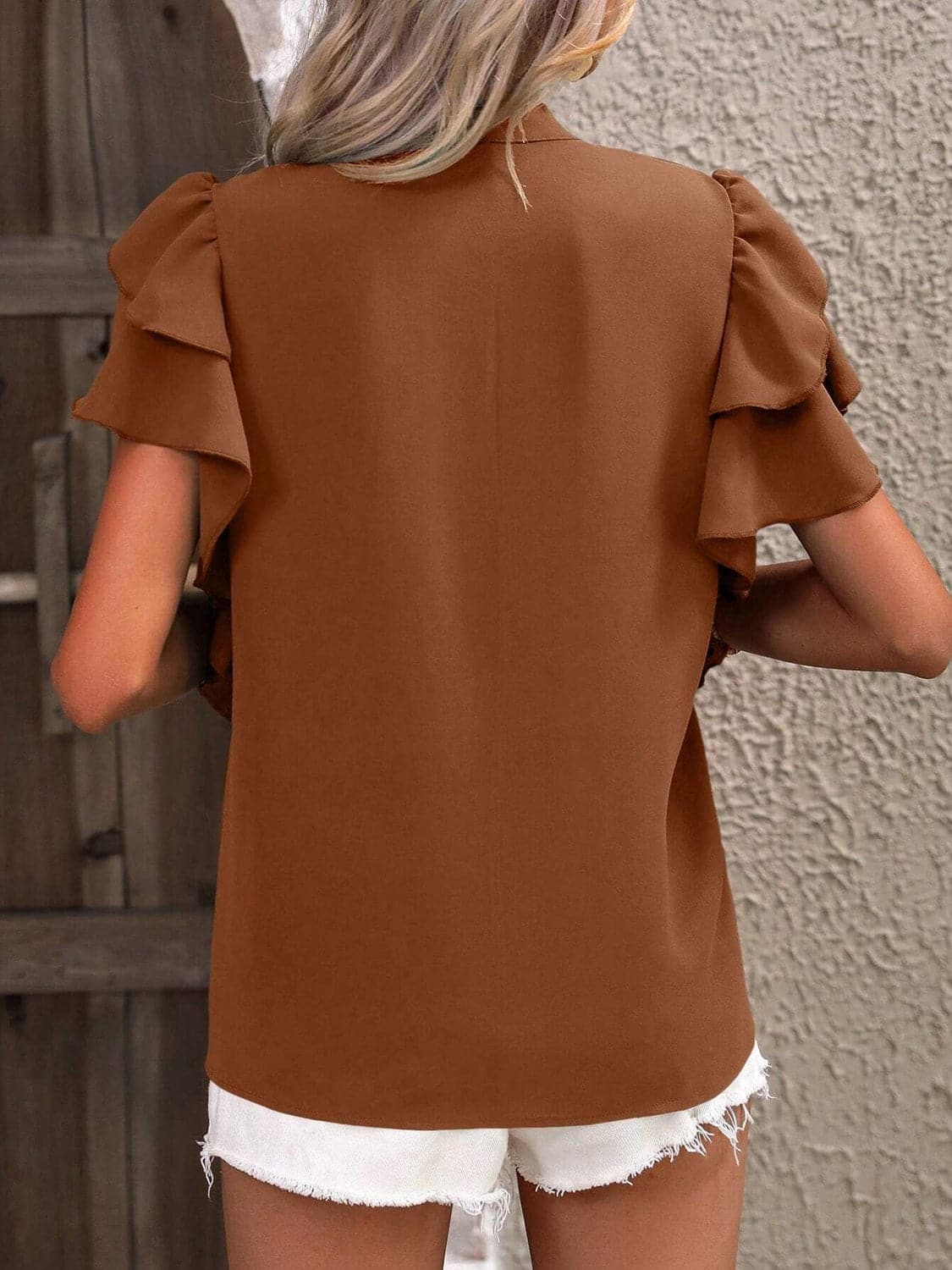 Ruffled Notched Short Sleeve Blouse.