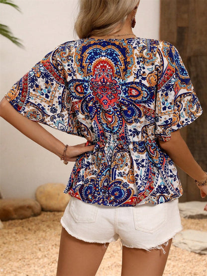 Printed Surplice Half Sleeve Blouse.