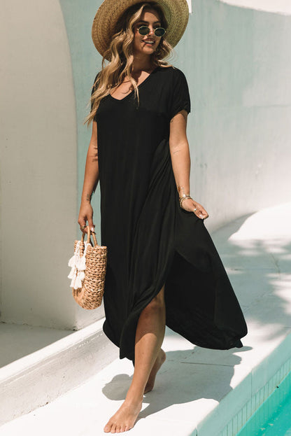 Elegant black v-neck maxi t-shirt dress with hidden pockets and stylish splits