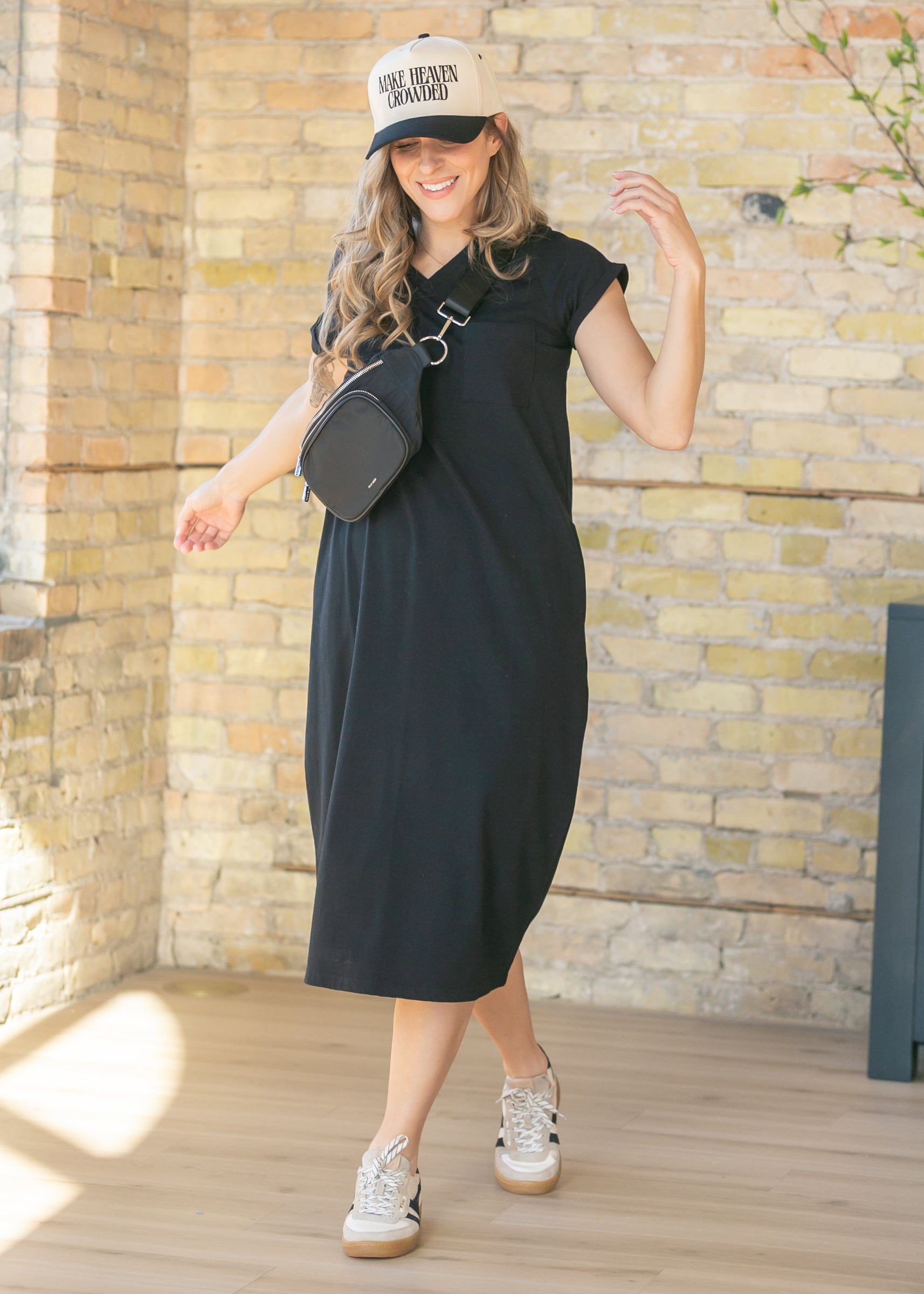 Close-up of the Inherit Co. Finley V-neck T-shirt Dress neckline, highlighting the soft fabric and flattering V-neck detail.