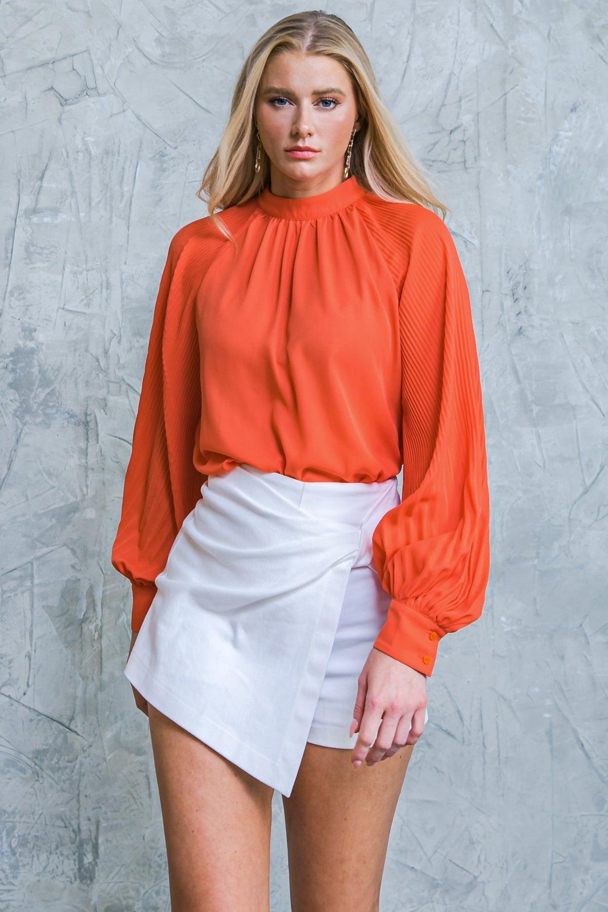 Flying Tomato MAKE NO MISTAKES WOVEN TOP worn by a model, demonstrating its versatile style for various quality outfits.