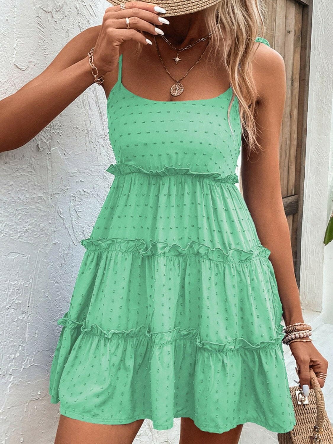 Elegant Tiered Spaghetti Strap Dress with Frill AccentsElegant Tiered Spaghetti Strap Dress with Frill Accents
 Step into sophistication with our Elegant Tiered Spaghetti Strap Dress, a blend of style and comfort that isLove Salve Elegant Tiered Spaghetti Strap DressColor