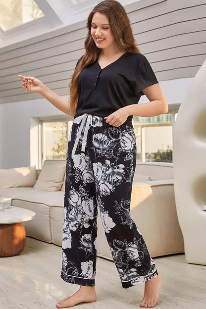 Vibrant Floral V-Neck Lounge Set with Soft PantsVibrant Floral V-Neck Lounge Set with Soft Pants
 Upgrade your loungewear collection with our Vibrant Floral V-Neck Lounge Set, a perfect blend of style and comfort!Love Salve -Neck Lounge Setlounge