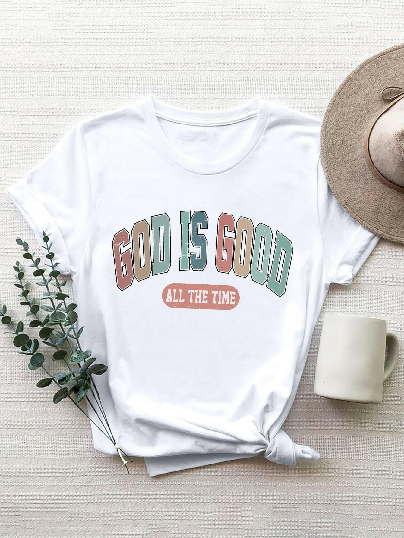 GOD IS GOOD ALL THE TIME Graphic Print TeeExperience Constant Positivity with the GOD IS GOOD ALL THE TIME Graphic Print Tee
 Embrace a simple yet impactful design that conveys a powerful message with this gLove Salve TIME Graphic Print TeeGraphic