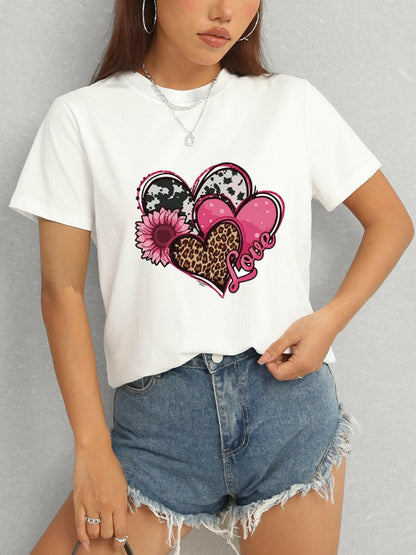 Lovely round neck short sleeve blouse with heart and floral design.