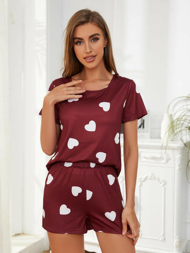 Heart Print Lounge Top and Shorts SetUpgrade Your Lounge Wear with This Heart Print Set!
 
 
Stay Stylishly Comfortable: Embrace a basic yet chic style with this two-piece lounge set.
 
Soft and Opaque:Love Salve Heart Print Lounge Toplounge