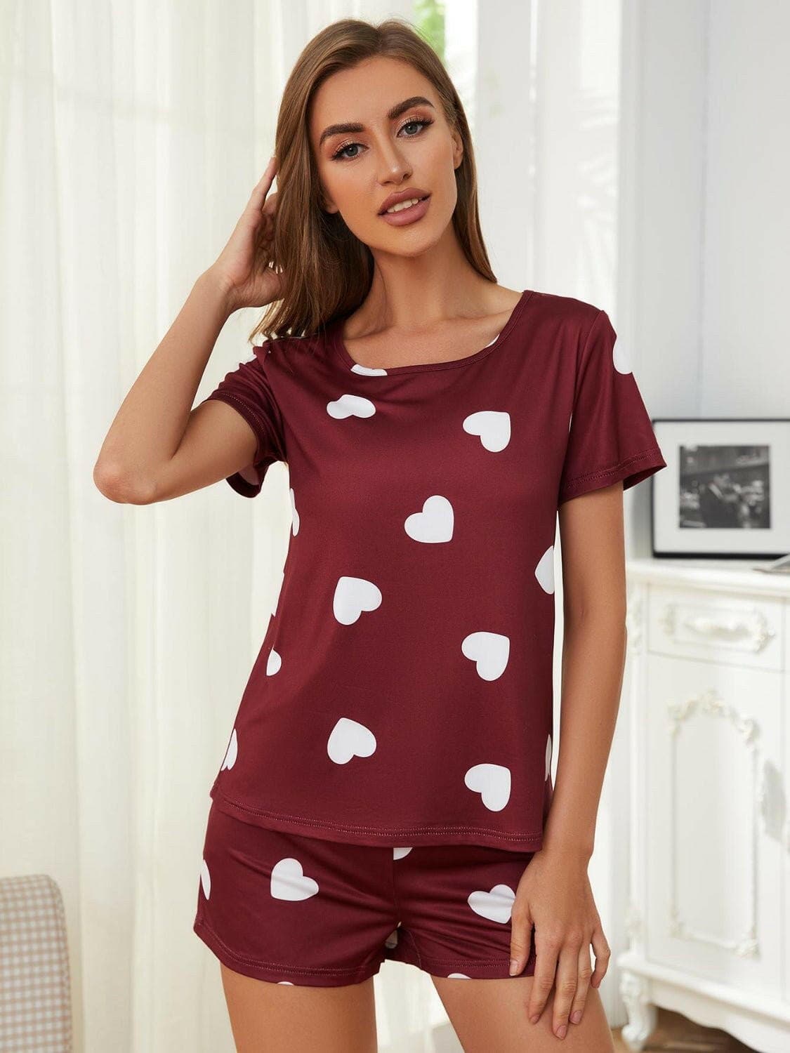 Heart Print Lounge Top and Shorts SetUpgrade Your Lounge Wear with This Heart Print Set!
 
 
Stay Stylishly Comfortable: Embrace a basic yet chic style with this two-piece lounge set.
 
Soft and Opaque:Love Salve Heart Print Lounge Toplounge