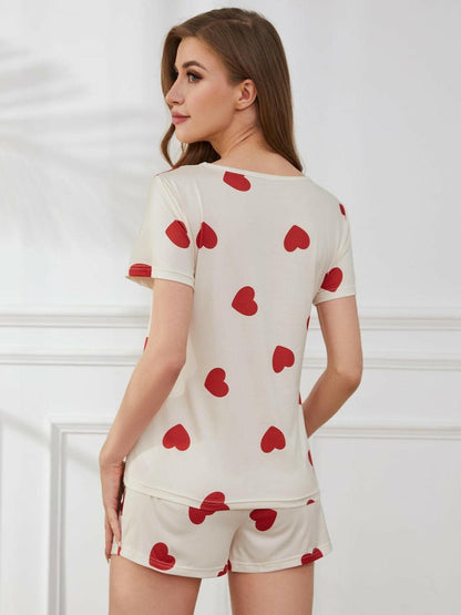 Heart Print Lounge Top and Shorts SetUpgrade Your Lounge Wear with This Heart Print Set!
 
 
Stay Stylishly Comfortable: Embrace a basic yet chic style with this two-piece lounge set.
 
Soft and Opaque:Love Salve Heart Print Lounge Toplounge