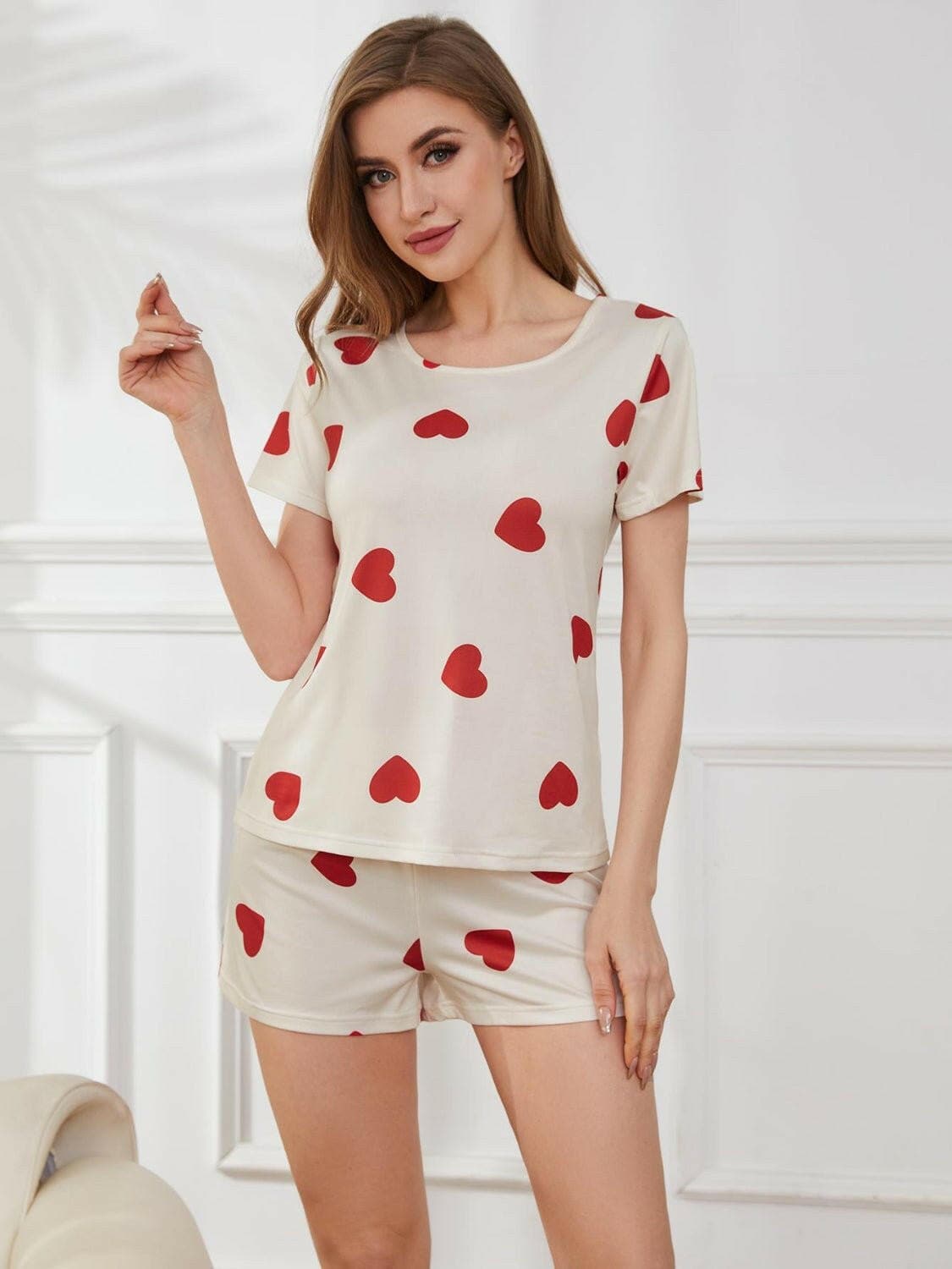 Heart Print Lounge Top and Shorts SetUpgrade Your Lounge Wear with This Heart Print Set!
 
 
Stay Stylishly Comfortable: Embrace a basic yet chic style with this two-piece lounge set.
 
Soft and Opaque:Love Salve Heart Print Lounge Toplounge