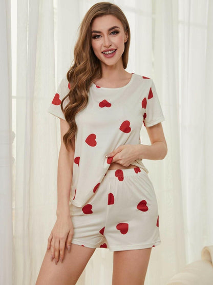 Heart Print Lounge Top and Shorts SetUpgrade Your Lounge Wear with This Heart Print Set!
 
 
Stay Stylishly Comfortable: Embrace a basic yet chic style with this two-piece lounge set.
 
Soft and Opaque:Love Salve Heart Print Lounge Toplounge