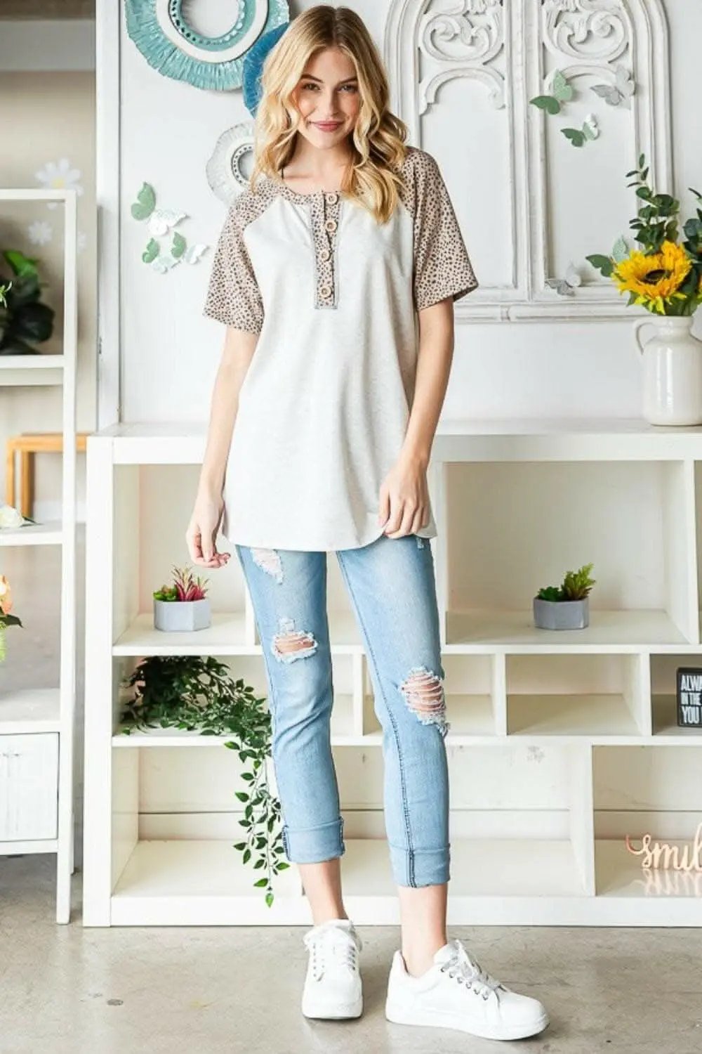 Untamed Elegance: Heimish Animal Print Half-Button Top - Love Salve 