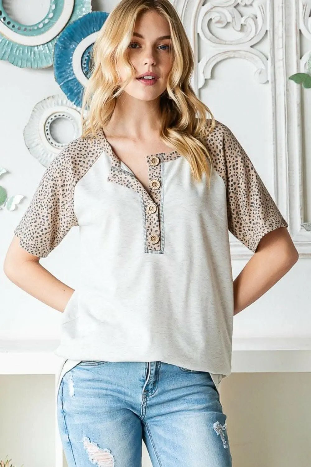 Untamed Elegance: Heimish Animal Print Half-Button Top - Love Salve 