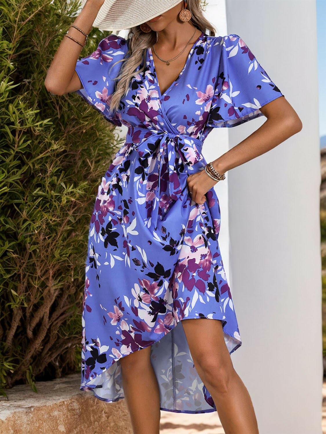 Chic Floral Wrap Short Sleeve High-Low Midi DressUpgrade Your Wardrobe with our Chic Floral Wrap High-Low Midi Dress!
 
 Wrap yourself in elegance with this stunning floral midi dress.
 Features a high-low design fLove Salve Chic Floral Wrap Short Sleeve High-Low Midi Dressjust arrived