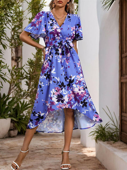 Chic Floral Wrap Short Sleeve High-Low Midi DressUpgrade Your Wardrobe with our Chic Floral Wrap High-Low Midi Dress!
 
 Wrap yourself in elegance with this stunning floral midi dress.
 Features a high-low design fLove Salve Chic Floral Wrap Short Sleeve High-Low Midi Dressjust arrived