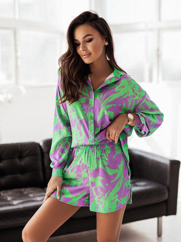 Women's vacation style printed shirt + shorts two-piece sets.