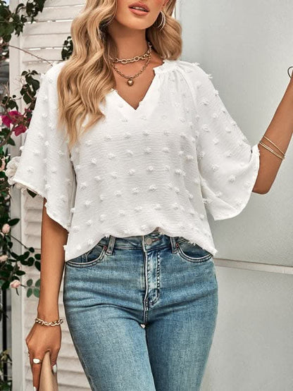 Women's casual style V-neck solid color pom pom top for women.