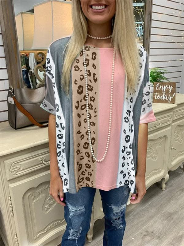 Printed half-sleeve loose casual pullover top.