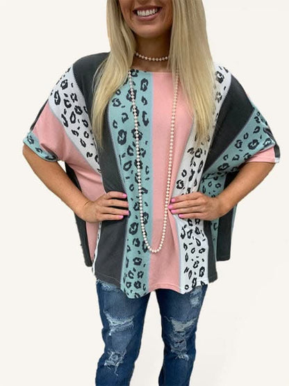 Printed half-sleeve loose casual pullover top.