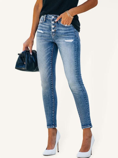 High-stretch ripped denim trousers