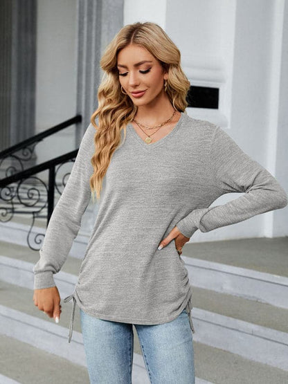 V-neck smocked long sleeve top