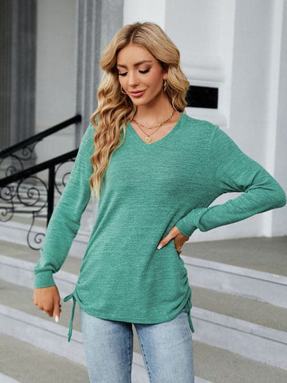 V-neck smocked long sleeve top