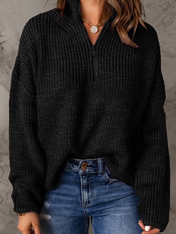 Women's zippered loose turtleneck long sleeve pullover sweater.